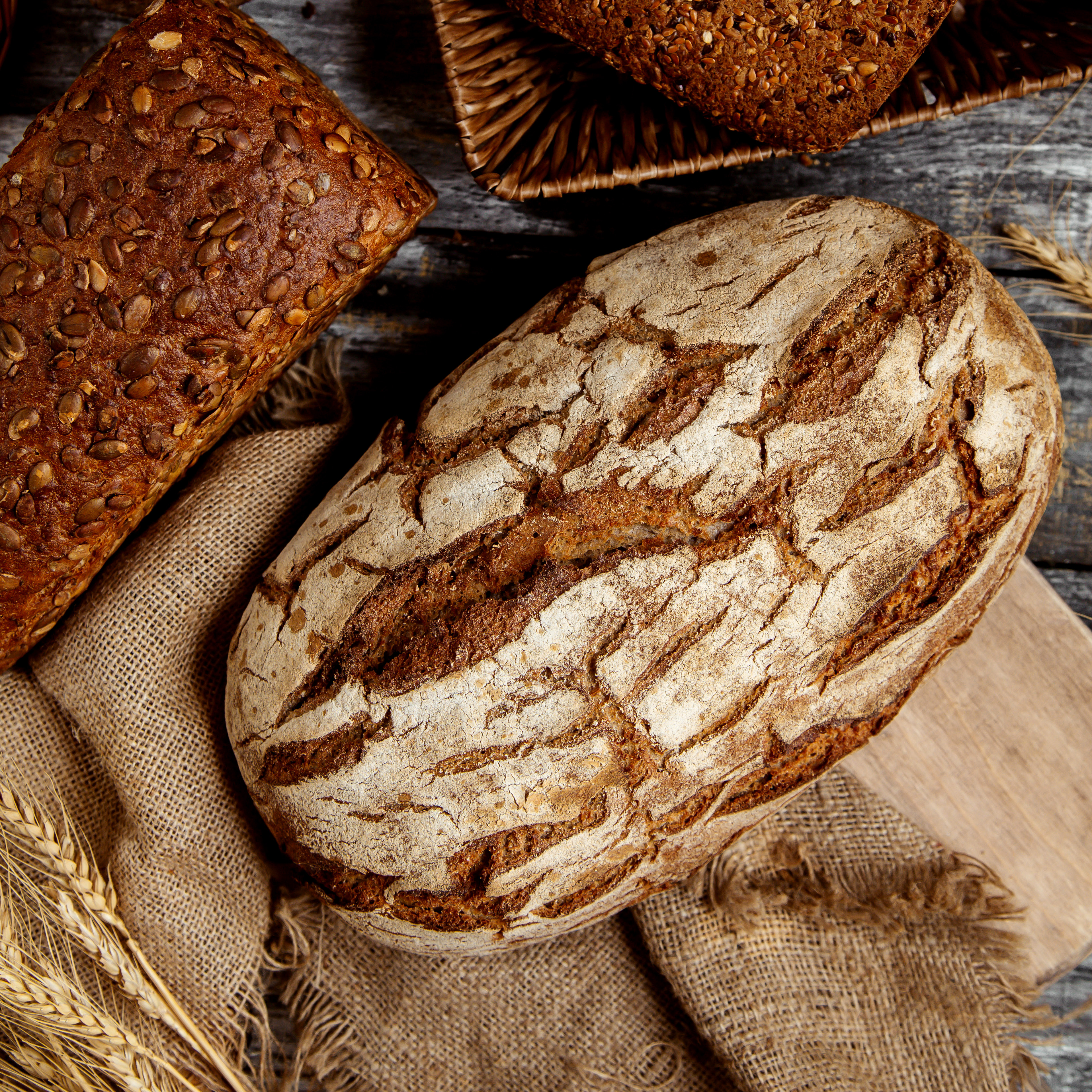 top-view-organic-whole-grain-breads-placed-linen-fabric-3835x3835.jpg
